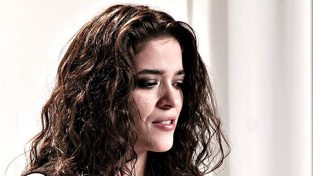 Cute babe teasing with vibrator