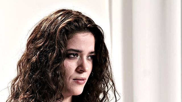 Cute babe teasing with vibrator