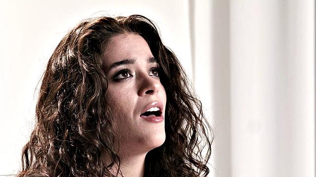 Cute babe teasing with vibrator