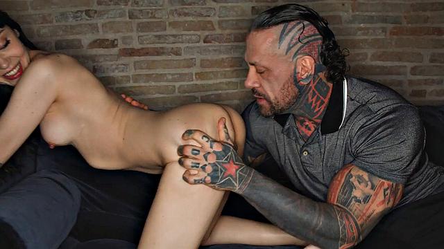 Inked fellow drills brunette girlpartner's clean-shaven cunny until she's frosted in cum.