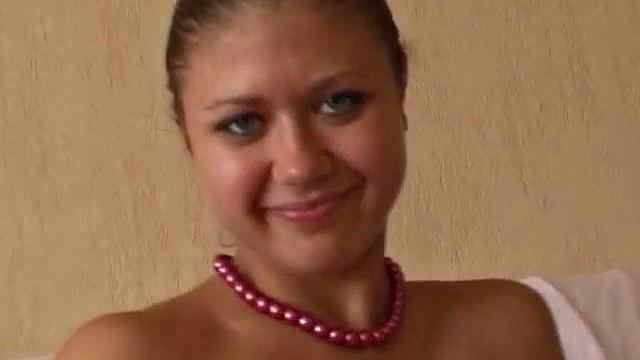 Blonde girl rubs her tight pussy