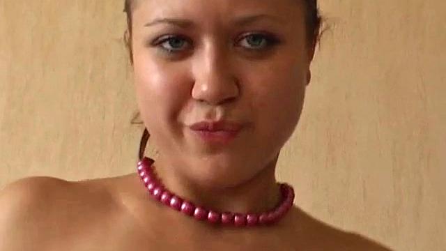 Blonde girl rubs her tight pussy