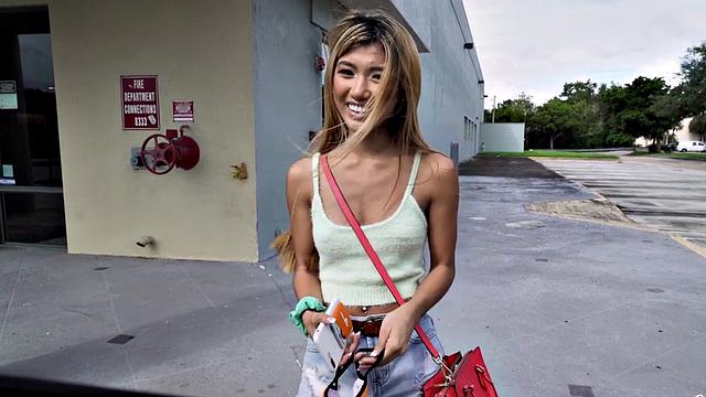 Big cock pounds a hot Asian teen in a car with a smile