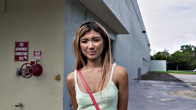 Big cock pounds a hot Asian teen in a car with a smile