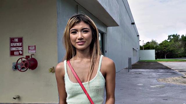 Big cock pounds a hot Asian teen in a car with a smile