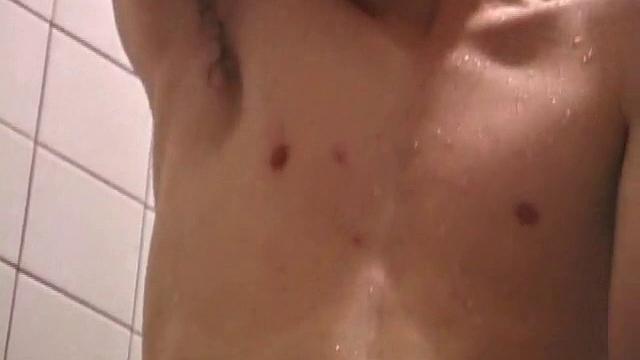 As Dan takes a shower he soaps down his wet naked body, working up a good lather and nice big boner. After edging himself a few times, he's squirting out a monster cum gusher.