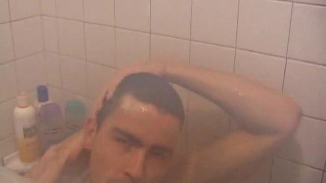 As Dan takes a shower he soaps down his wet naked body, working up a good lather and nice big boner. After edging himself a few times, he's squirting out a monster cum gusher.