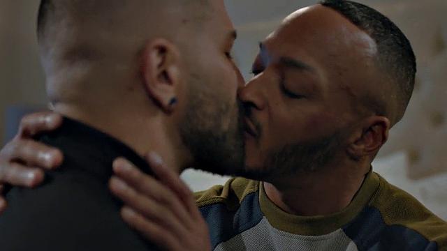 Bottom BBC barebacked by inked stud in doggy on bed