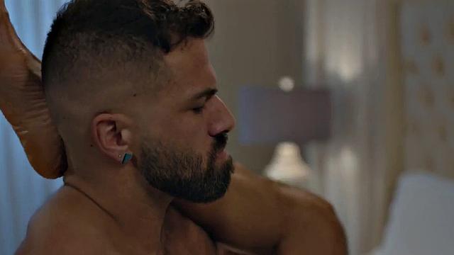 Bottom BBC barebacked by inked stud in doggy on bed