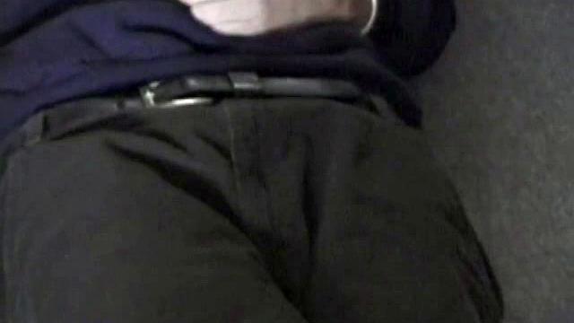 Adam relaxes on the floor watching porn video, strokes cock, plays with butthole, and blasts cum load onto skateboard