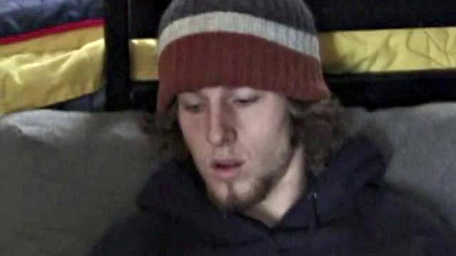 Adam relaxes on the floor watching porn video, strokes cock, plays with butthole, and blasts cum load onto skateboard