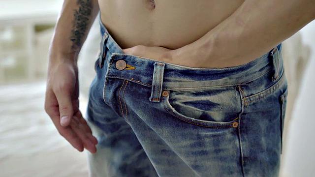 A hot athletic twink tease and tug on a huge cock while flaunting his ink