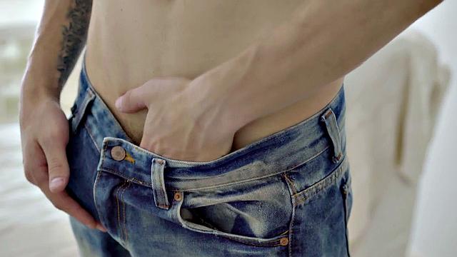 A hot athletic twink tease and tug on a huge cock while flaunting his ink