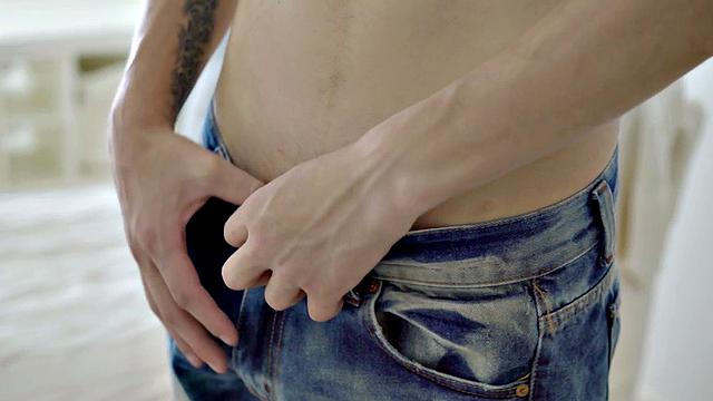 A hot athletic twink tease and tug on a huge cock while flaunting his ink