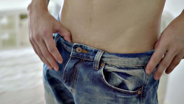 A hot athletic twink tease and tug on a huge cock while flaunting his ink