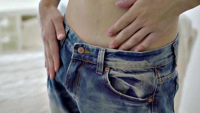 A hot athletic twink tease and tug on a huge cock while flaunting his ink