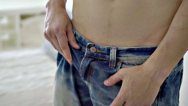 A hot athletic twink tease and tug on a huge cock while flaunting his ink