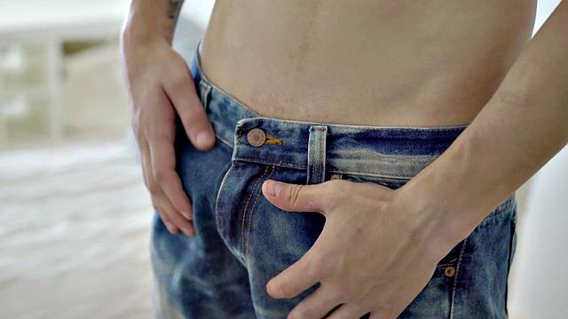 A hot athletic twink tease and tug on a huge cock while flaunting his ink