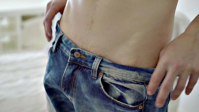 A hot athletic twink tease and tug on a huge cock while flaunting his ink