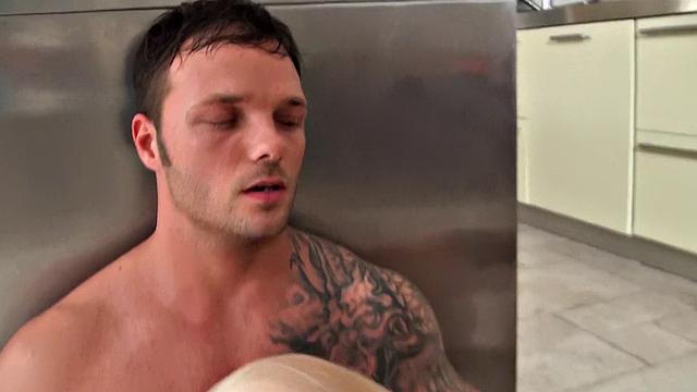 Blonde with tattoos and high heels enjoys kitchen play and pussy licking in reverse cowgirl position