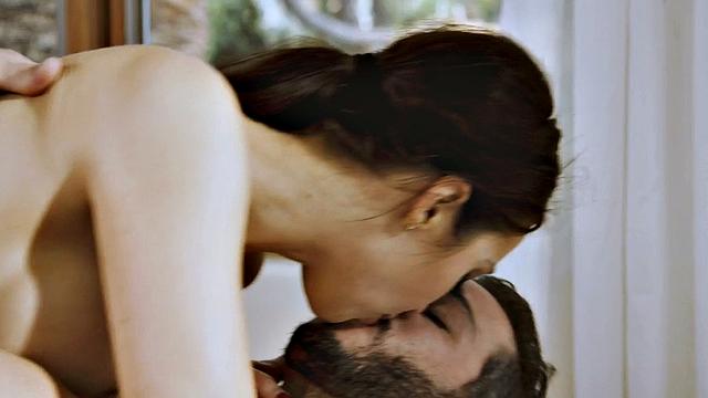 Busty oiled babe gets licked and fucked on the massage table