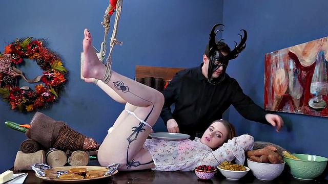Watch Jessica Kay's ass get plugged and her mask ripped off while she dominates in kinky food play