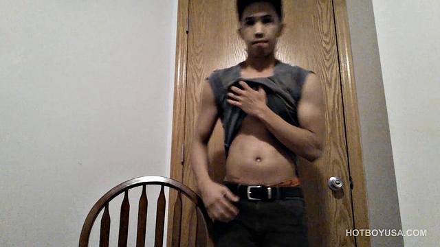 Raul Mendez is a slim and smooth Latin twink, with a buff body and fine little butt. Once naked, he grabs hold of his dick and begins working it stiff.