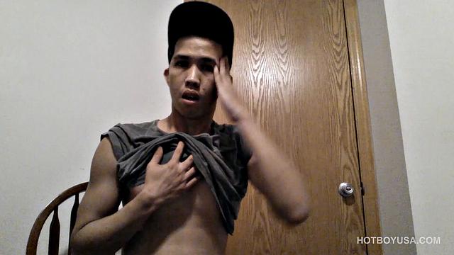 Raul Mendez is a slim and smooth Latin twink, with a buff body and fine little butt. Once naked, he grabs hold of his dick and begins working it stiff.