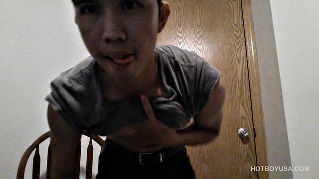 Raul Mendez is a slim and smooth Latin twink, with a buff body and fine little butt. Once naked, he grabs hold of his dick and begins working it stiff.