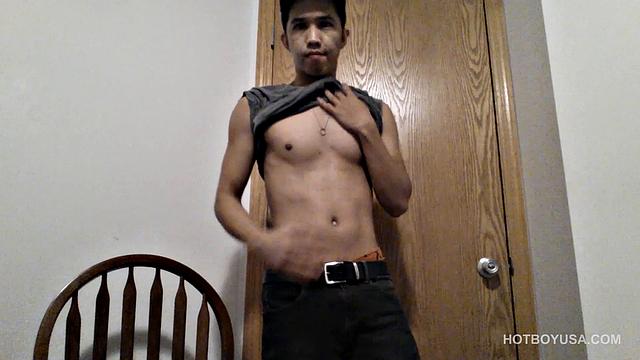 Raul Mendez is a slim and smooth Latin twink, with a buff body and fine little butt. Once naked, he grabs hold of his dick and begins working it stiff.