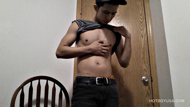 Raul Mendez is a slim and smooth Latin twink, with a buff body and fine little butt. Once naked, he grabs hold of his dick and begins working it stiff.