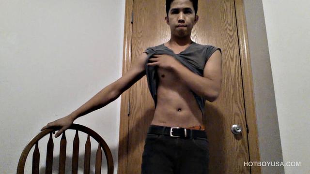 Raul Mendez is a slim and smooth Latin twink, with a buff body and fine little butt. Once naked, he grabs hold of his dick and begins working it stiff.