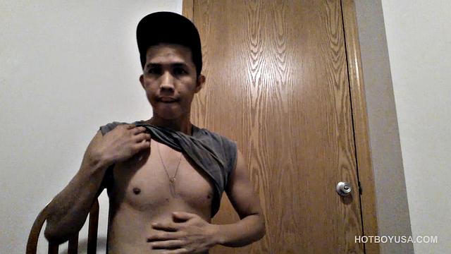 Raul Mendez is a slim and smooth Latin twink, with a buff body and fine little butt. Once naked, he grabs hold of his dick and begins working it stiff.