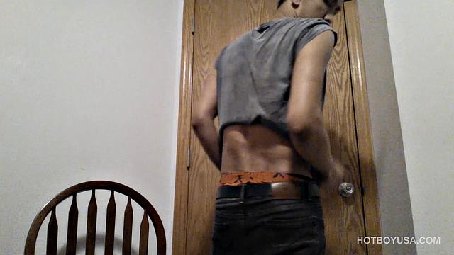 Raul Mendez is a slim and smooth Latin twink, with a buff body and fine little butt. Once naked, he grabs hold of his dick and begins working it stiff.