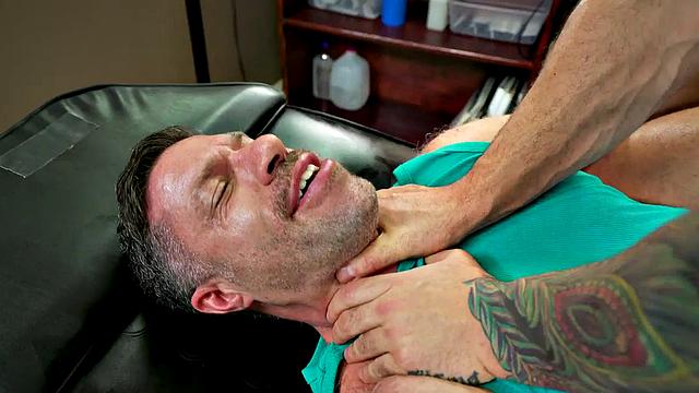 Muscular hunk with tattoos takes bareback anal pounding from hung dude