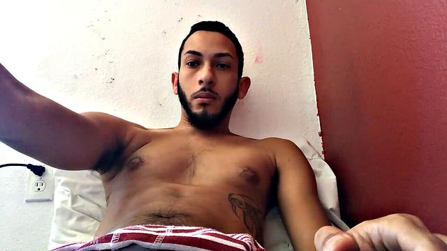 Brain works up a boner and then pushes down his shorts to free big dick and balls. Balls are literally rubbing against the laptop used to record this jerk off session.