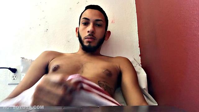 Brain works up a boner and then pushes down his shorts to free big dick and balls. Balls are literally rubbing against the laptop used to record this jerk off session.