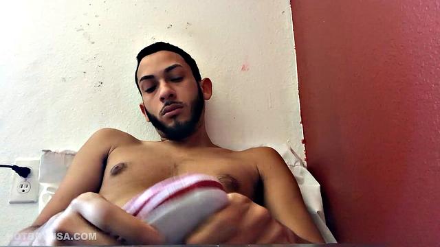 Brain works up a boner and then pushes down his shorts to free big dick and balls. Balls are literally rubbing against the laptop used to record this jerk off session.