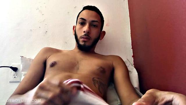 Brain works up a boner and then pushes down his shorts to free big dick and balls. Balls are literally rubbing against the laptop used to record this jerk off session.