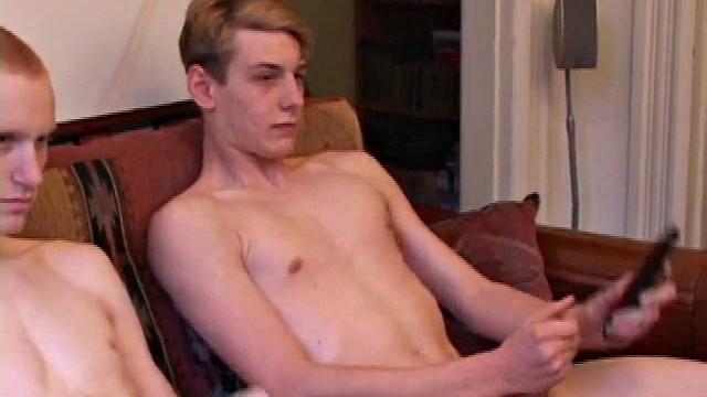 Richard, Kaos and Skylerr turn on some porn and start grabbing their crotches, before stripping naked. After passing the lube around they stroke their boners.