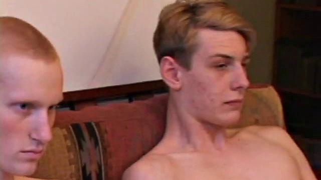 Richard, Kaos and Skylerr turn on some porn and start grabbing their crotches, before stripping naked. After passing the lube around they stroke their boners.