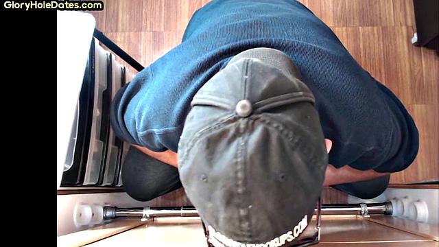 Senior gloryhole DILF blows BF's dick through hole