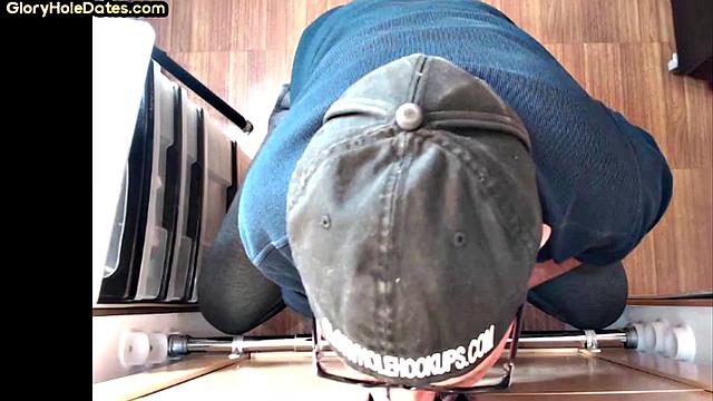 Senior gloryhole DILF blows BF's dick through hole