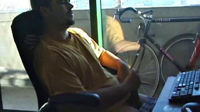 Young Tony returns for another solo session and after pulling off his pants he strokes up a stiff one, while watching some on his computer. After jacking off with determination, Tony strokes out another messy cum shot