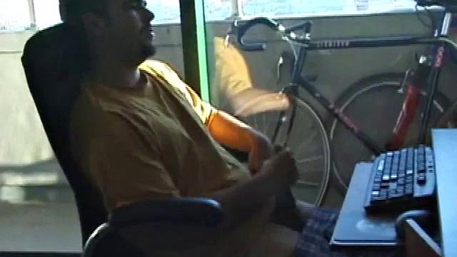 Young Tony returns for another solo session and after pulling off his pants he strokes up a stiff one, while watching some on his computer. After jacking off with determination, Tony strokes out another messy cum shot