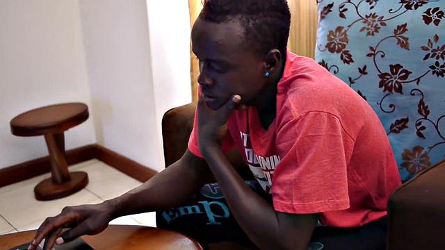 Amateur African twink jerks cock and fingers ass