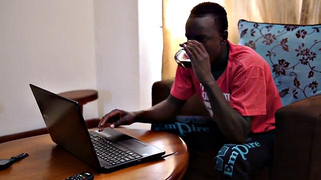 Amateur African twink jerks cock and fingers ass