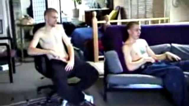 These two straight boys decide to jack off again while watching a porn video, never once glancing at each other, but the curiosity is there and they're clearly turned on by the other's presence.