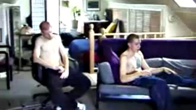 These two straight boys decide to jack off again while watching a porn video, never once glancing at each other, but the curiosity is there and they're clearly turned on by the other's presence.