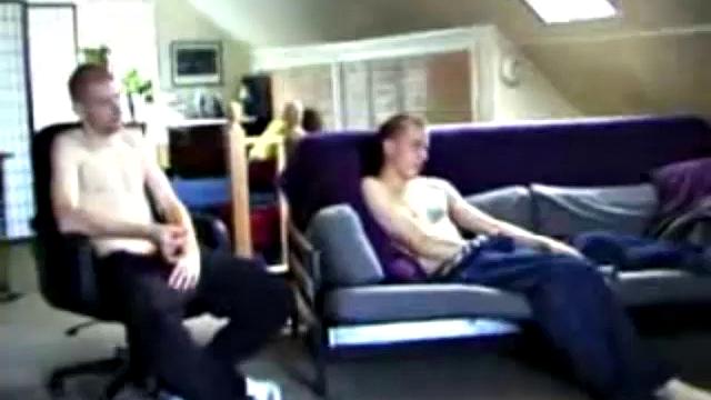 These two straight boys decide to jack off again while watching a porn video, never once glancing at each other, but the curiosity is there and they're clearly turned on by the other's presence.